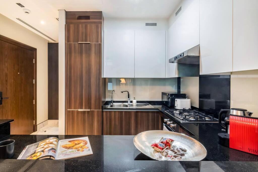 Jone Brand-new Aptm Near Mall & Burj Khalifa Апартаменти Дубай